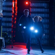 Agents Mulder (David Duchovny) and Scully (Gillian Anderson) run from their new robot overlords in the X-Files episode “Rm9sbG93ZXJz.”